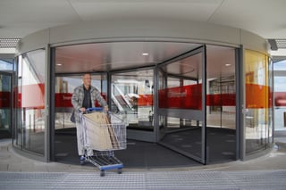 large capacity revolving door accommodates shopping cart